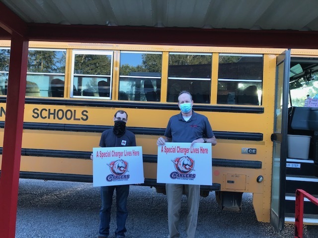 Weir Elementary School Teachers with Charger Signs