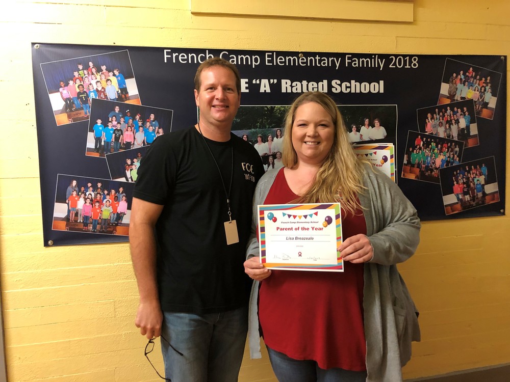 Mr. Burton presents Lisa Breazeale as Parent of the Year